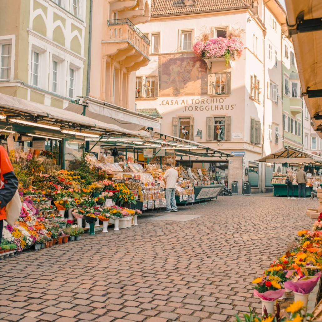 A sidewalk in Italy with porphyry paving stones